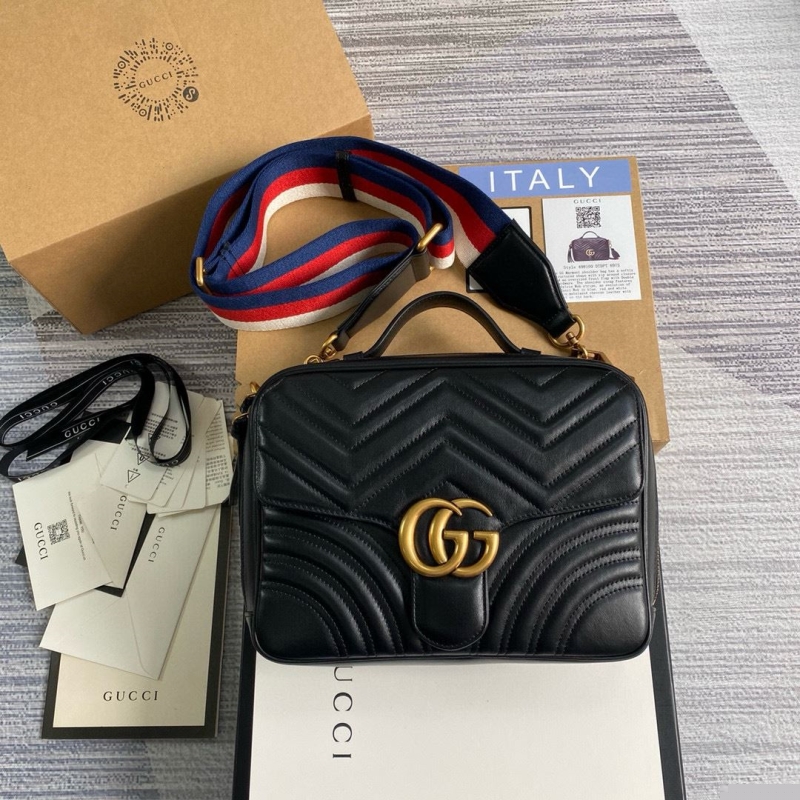 G*u*i top handle bags